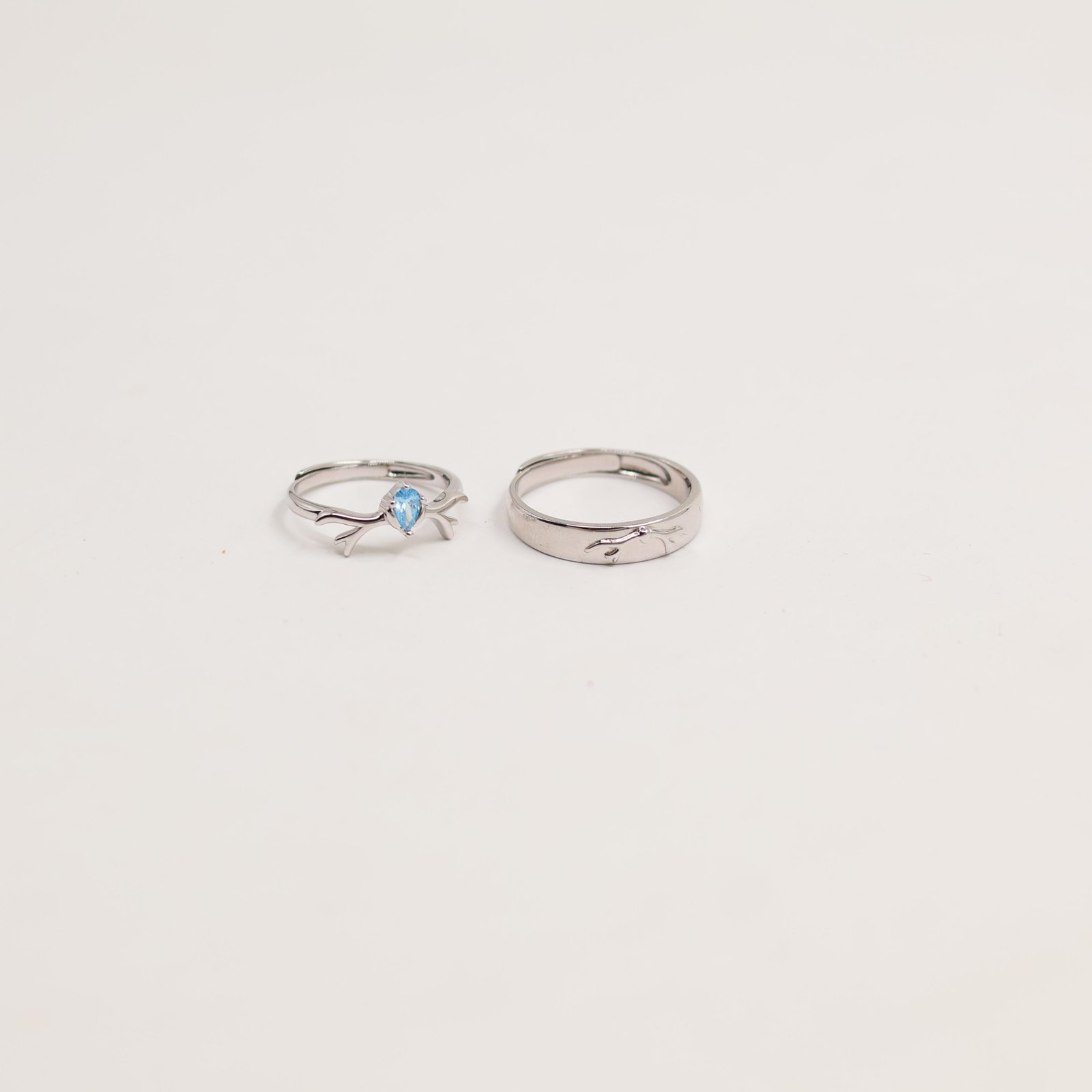 Silver Bypass Twist Solitaire Ring